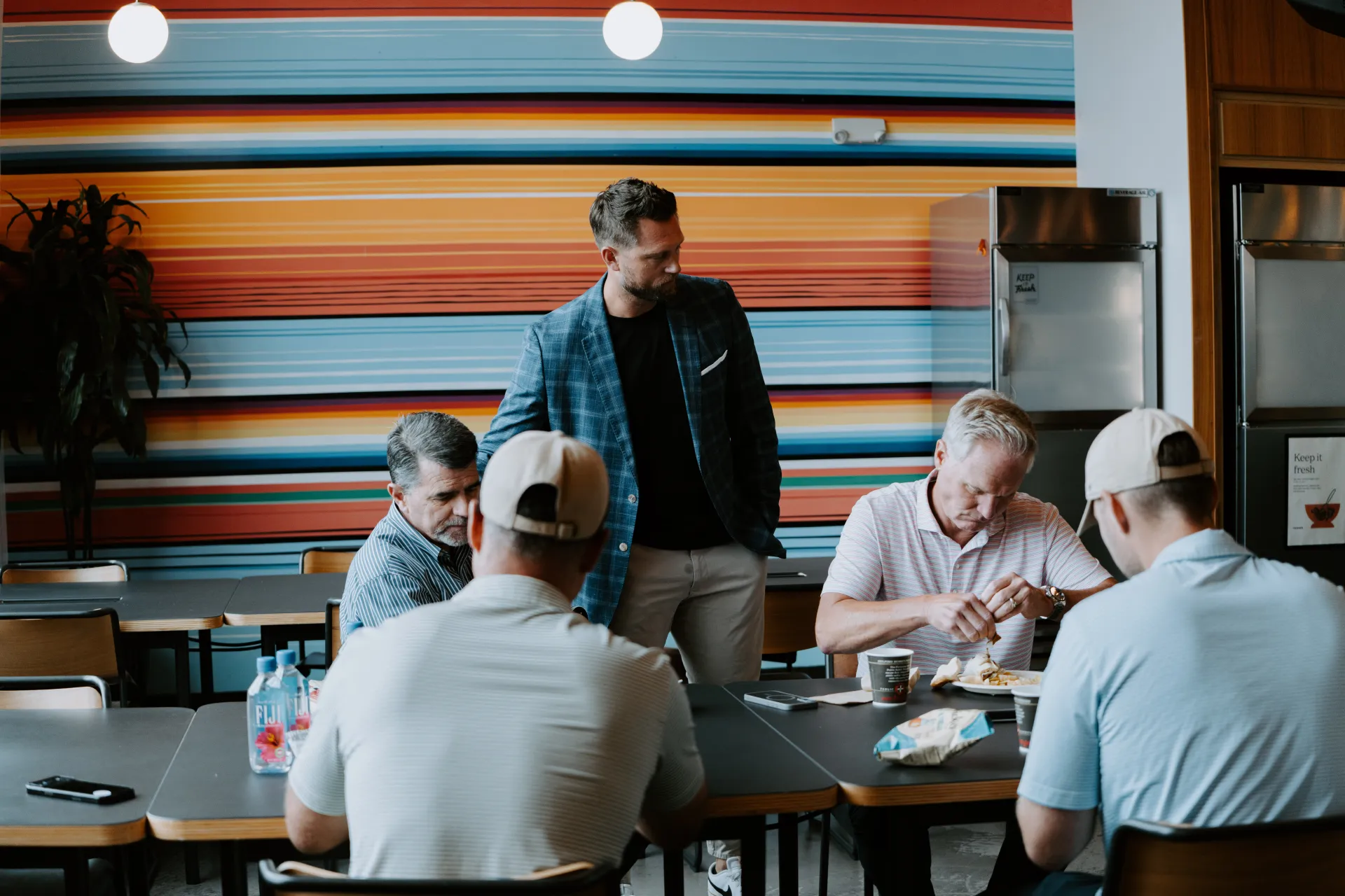 Ryan Groth leading a boardroom session with contractor owners