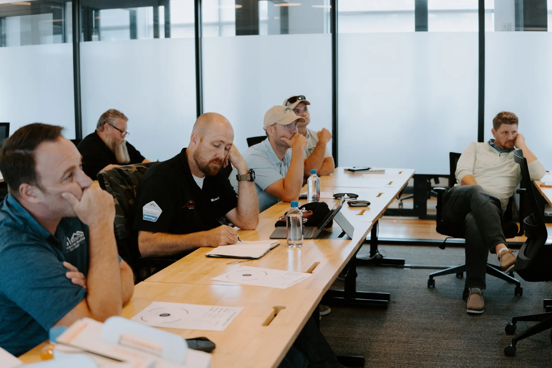 A full room of contractor owners at an STG group workshop